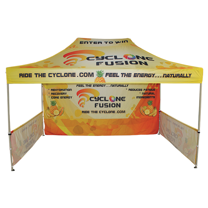 Custom printed tent backdrop facing inward at a trade show booth setup.