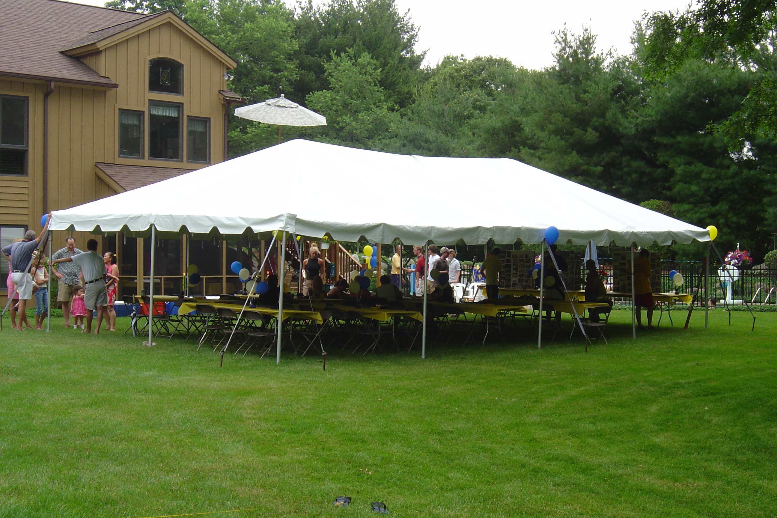 White party frame tent setup for graduation party