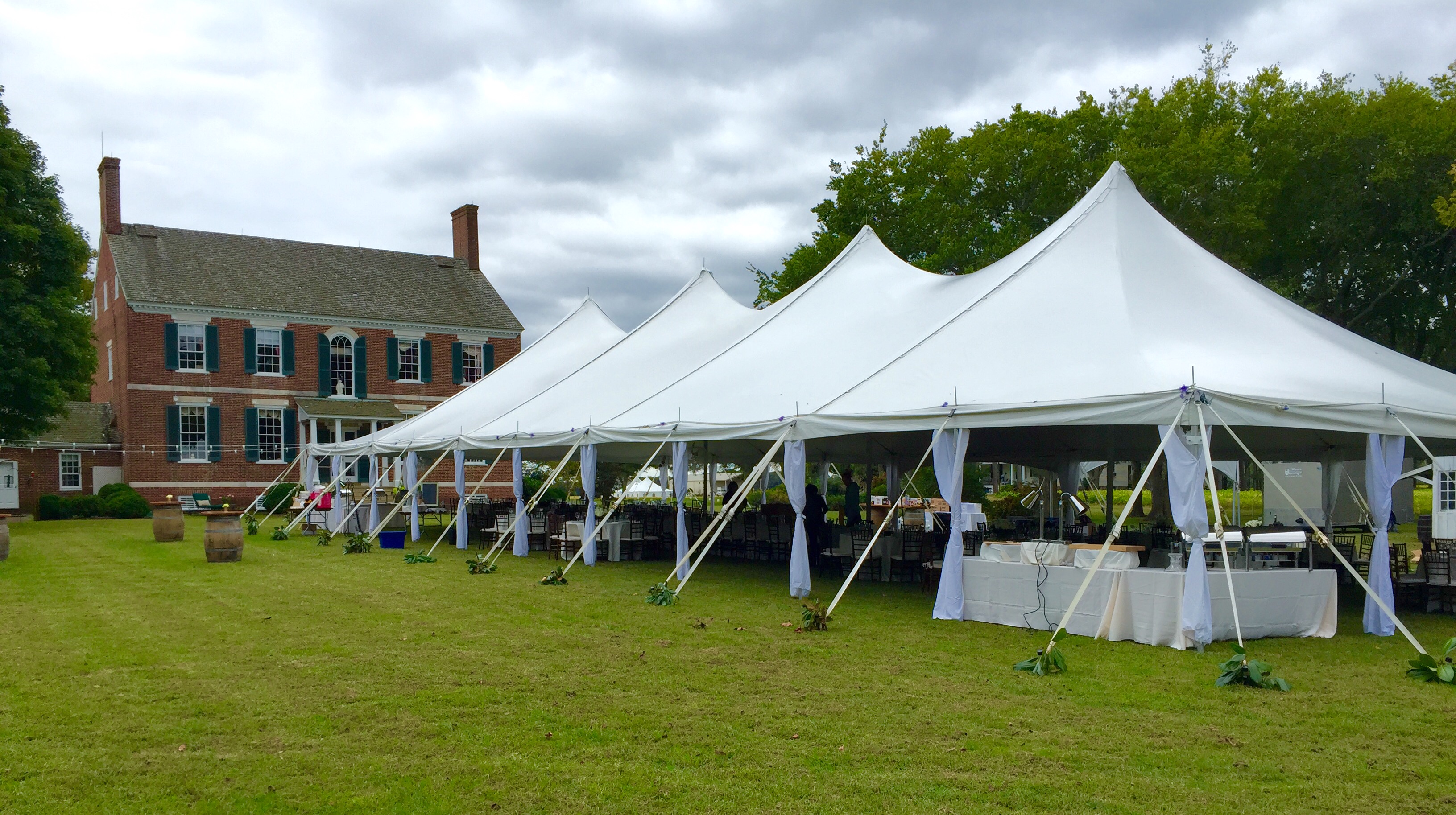 Sectional high peak pole tent event