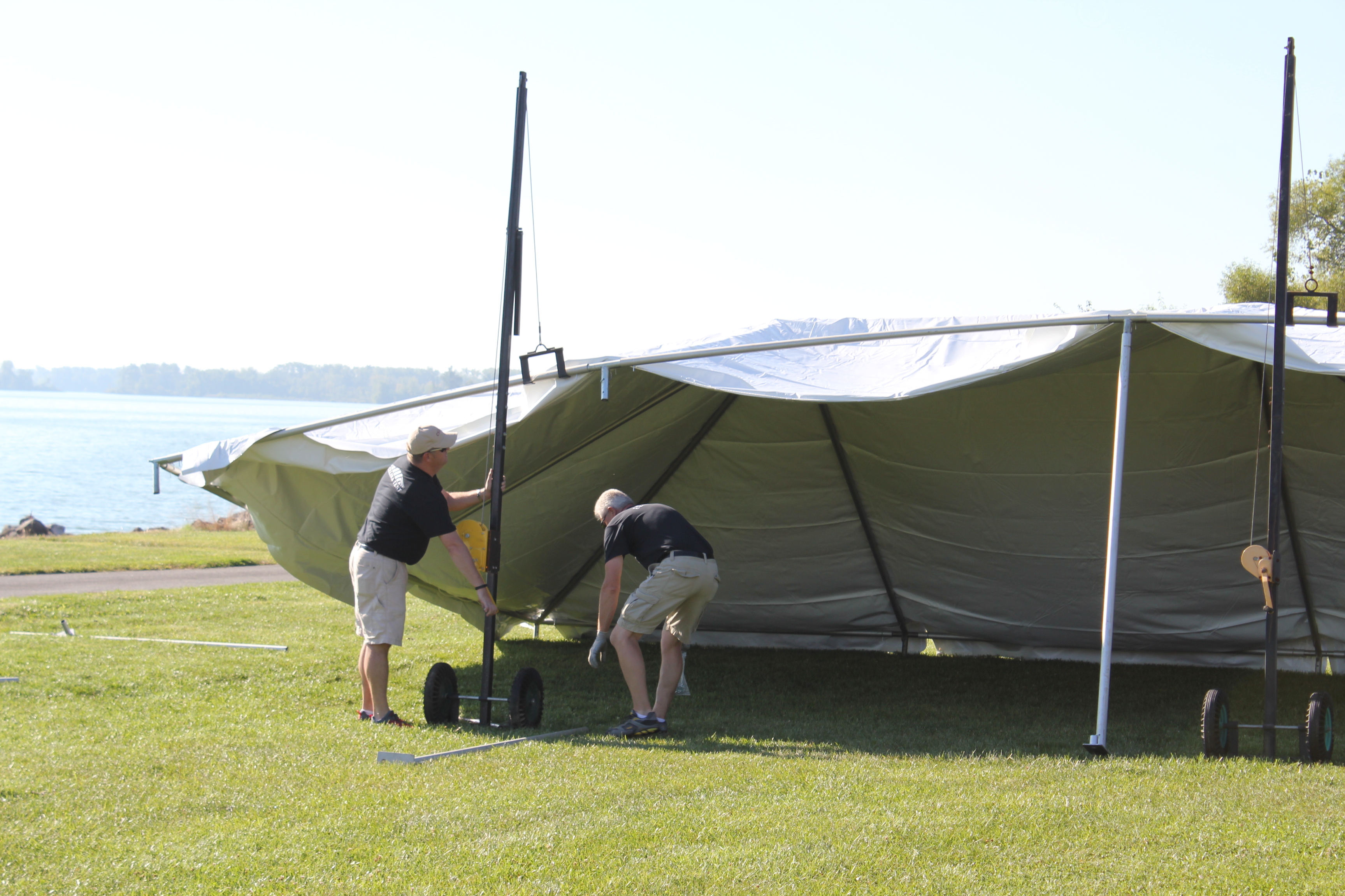 Frame tent jack in use setting up a master series frame tent