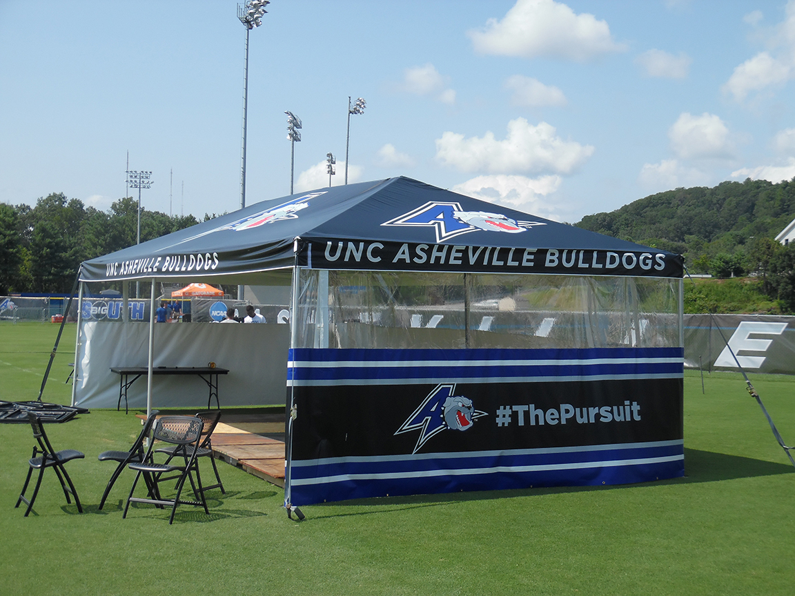 Durable, high-quality team tent set up on a sunny game day