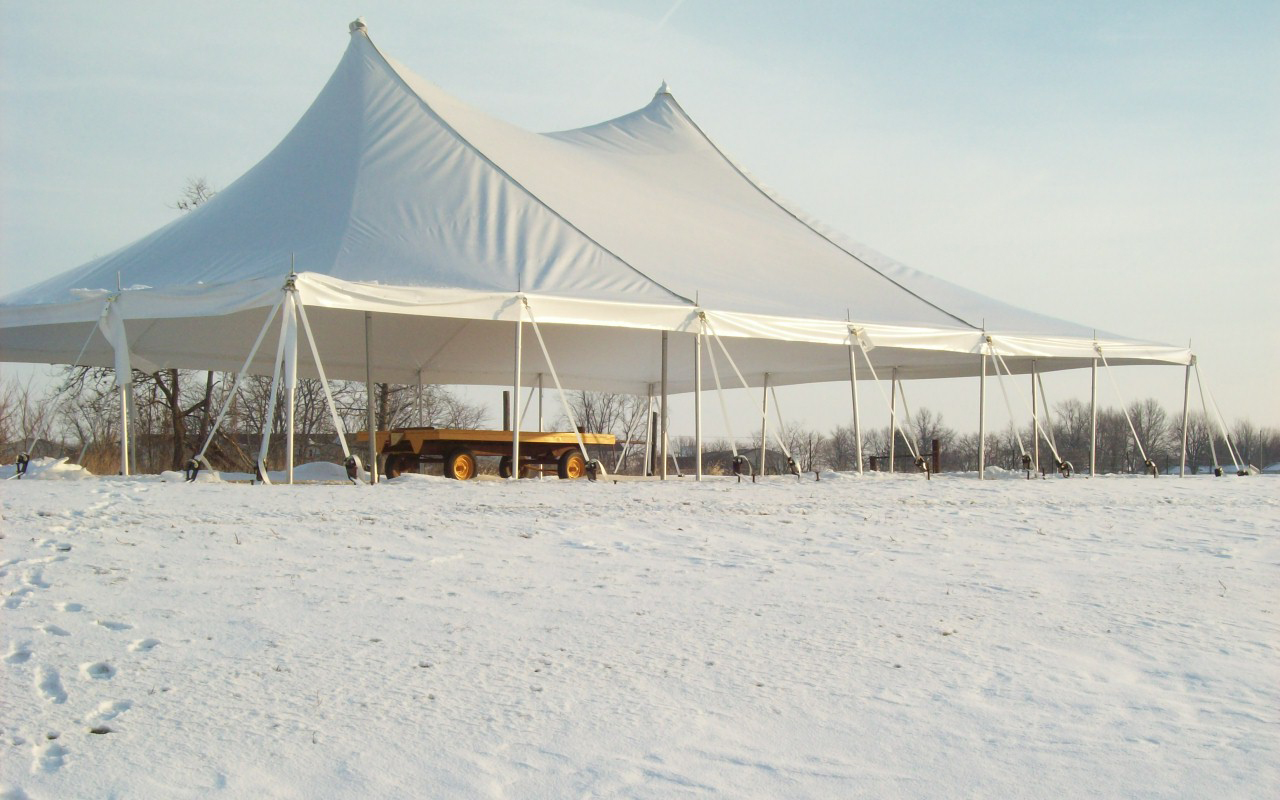 Premiere Series Pole Tent setup in the snow
